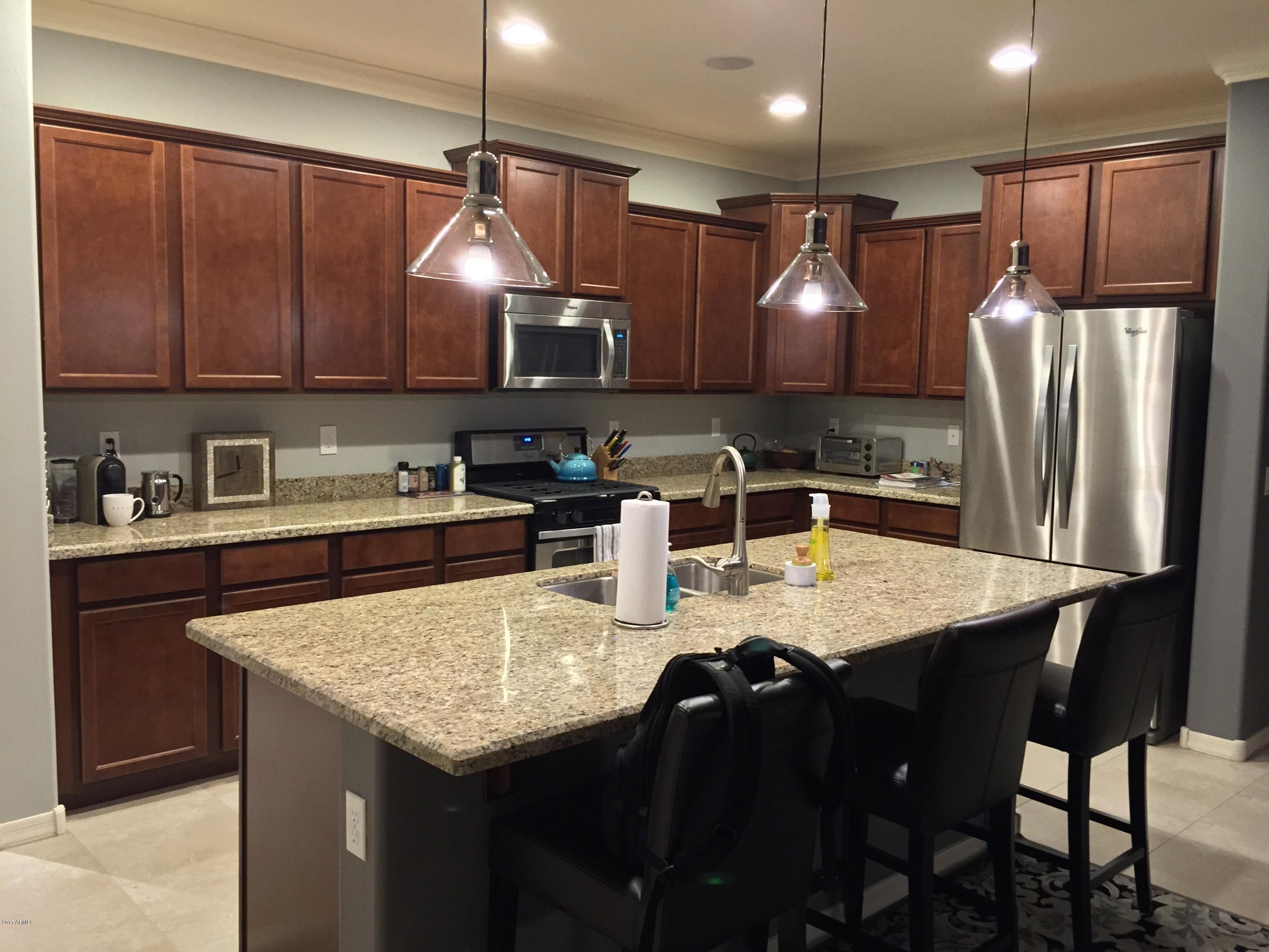 2428 West Beverly Rd. Phoenix, AZ 85041 - Photo 1 of 19 Kitchen after paint and crown