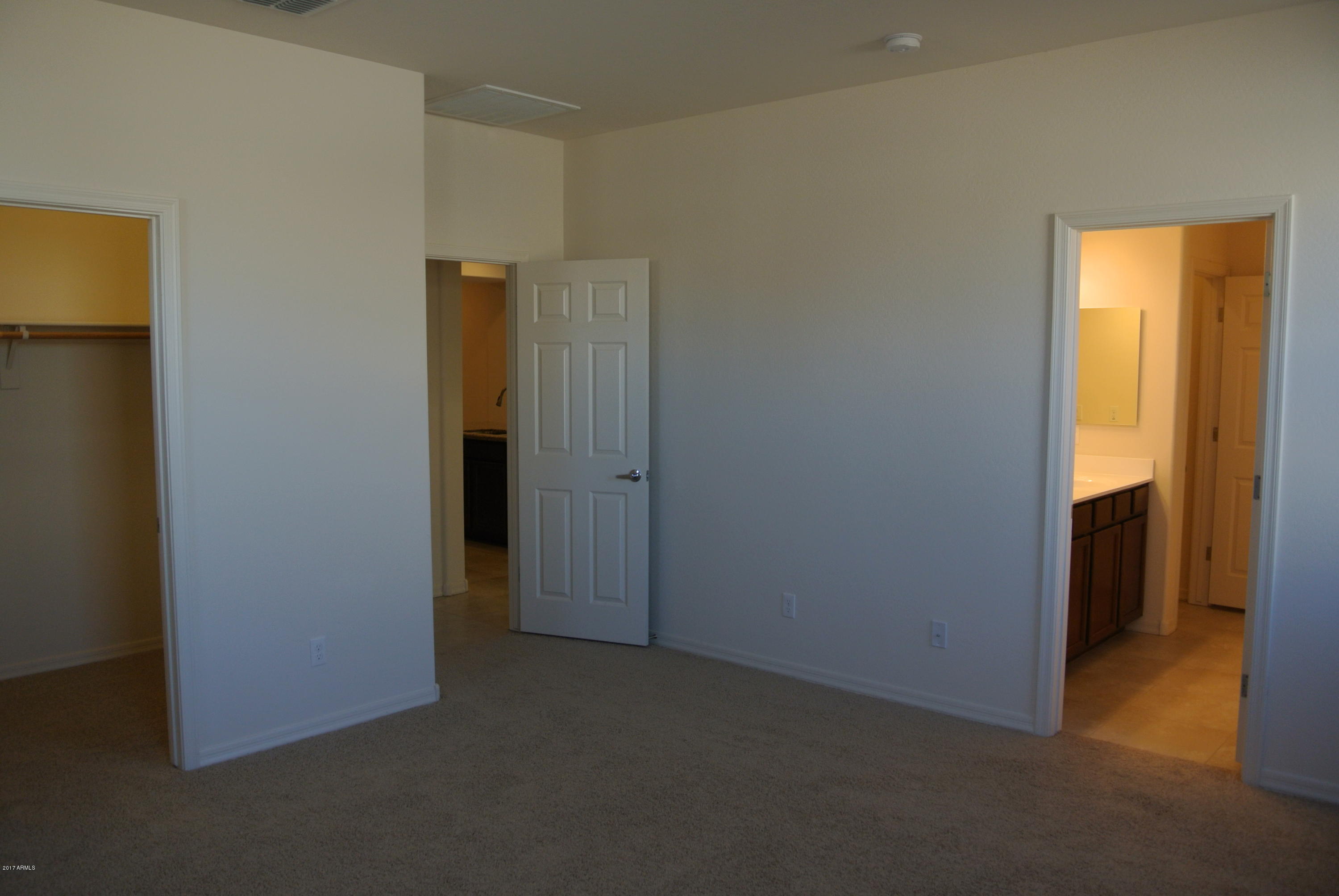 2428 West Beverly Rd. Phoenix, AZ 85041 - Photo 12 of 19 Master bedroom before paint and crown