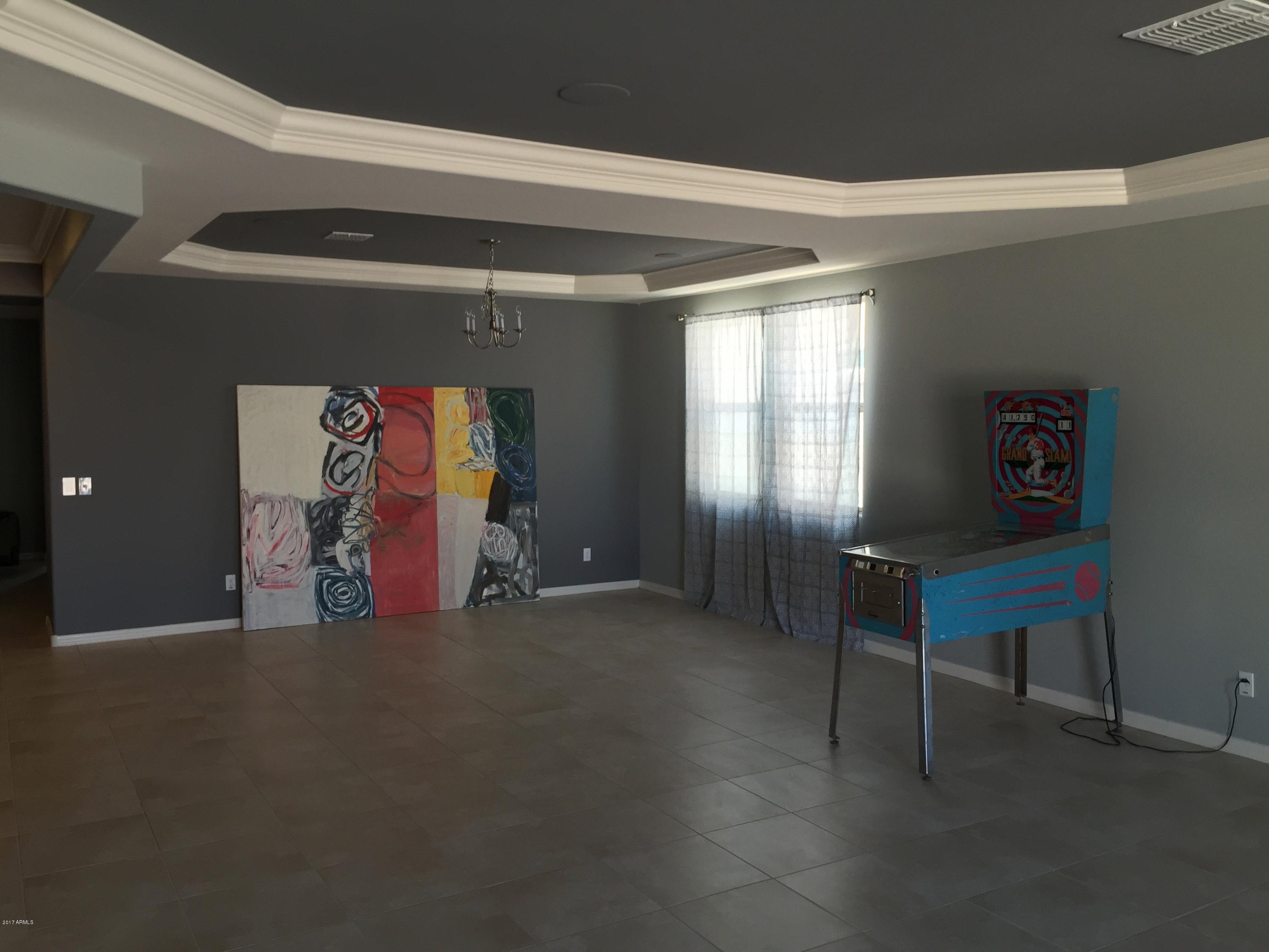 2428 West Beverly Rd. Phoenix, AZ 85041 - Photo 6 of 19 Family room and Dining Areaa