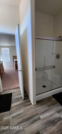 a bathroom with a toilet and a view
