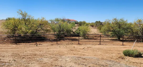a view of yard and covered with snow