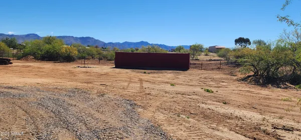 a backyard of a house with mountain view