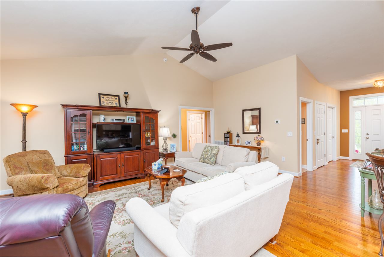 283 Round Hill School Road Fort Defiance, VA 24437 - Photo 14 of 48 a living room with furniture and a flat screen tv