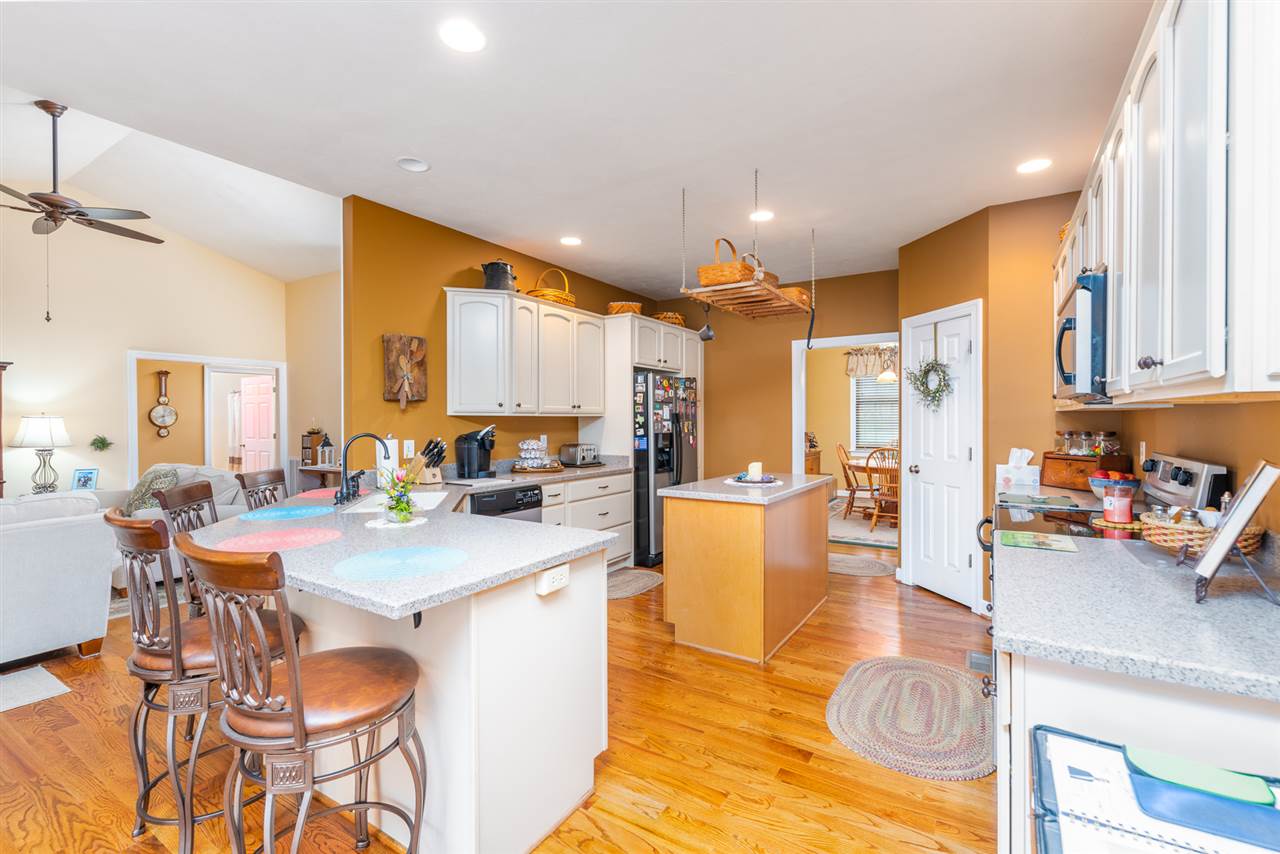 283 Round Hill School Road Fort Defiance, VA 24437 - Photo 20 of 48 a large kitchen with a table and chairs