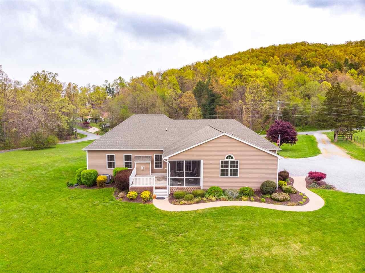 283 Round Hill School Road Fort Defiance, VA 24437 - Photo 4 of 48 a aerial view of a house with swimming pool and a yard