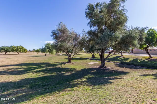 a view of a sign board with an ocean view