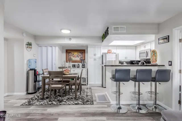 a view of a dining room with furniture