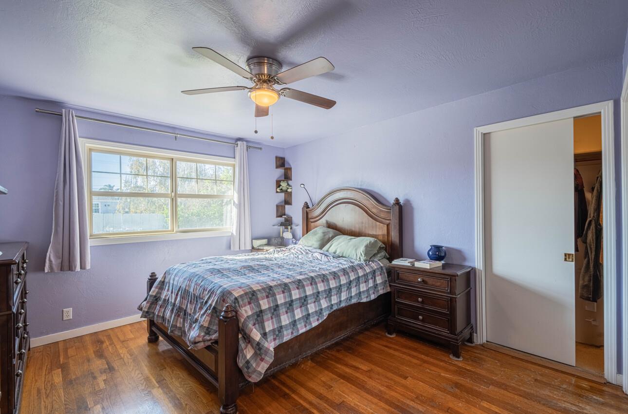 194 Riker Terrace Salinas, CA 93901 - Photo 21 of 36 a bedroom with a bed and a window