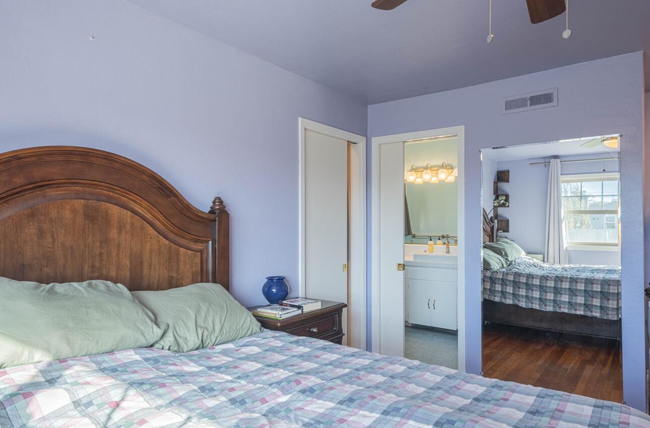 194 Riker Terrace Salinas, CA 93901 - Photo 22 of 36 a bedroom with a bed and a window