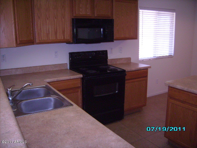 8326 West Payson Road Tolleson, AZ 85353 - Photo 3 of 10 Kitchen 2