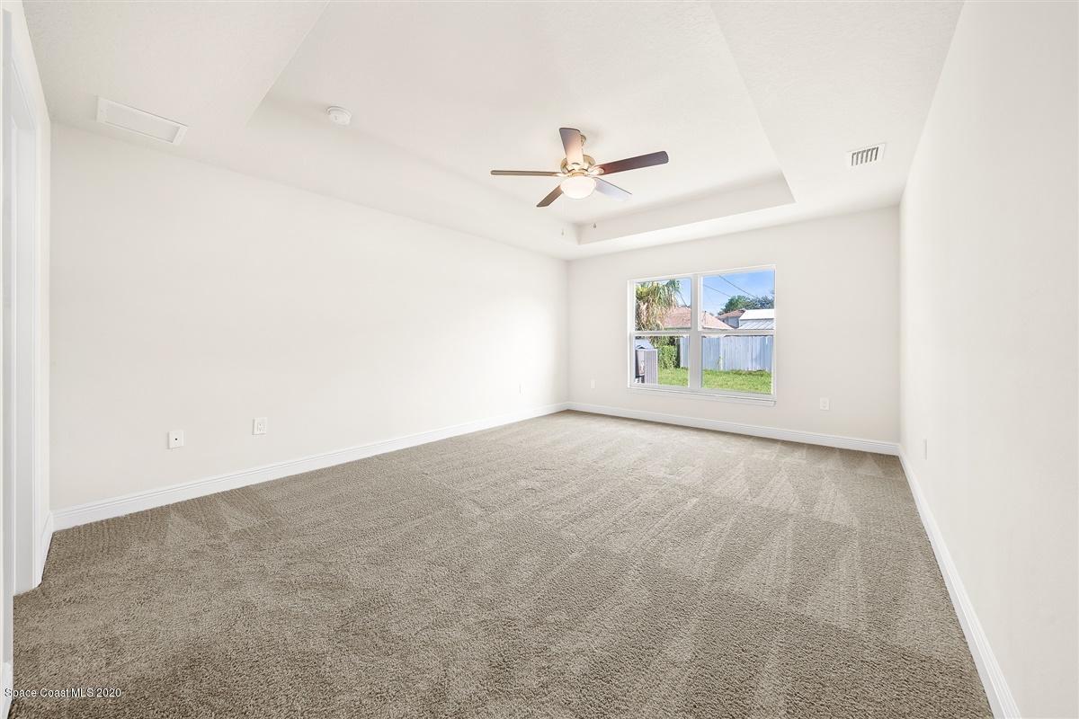514 Avondale Road Northeast Palm Bay, FL 32907 - Photo 13 of 35 master bedroom