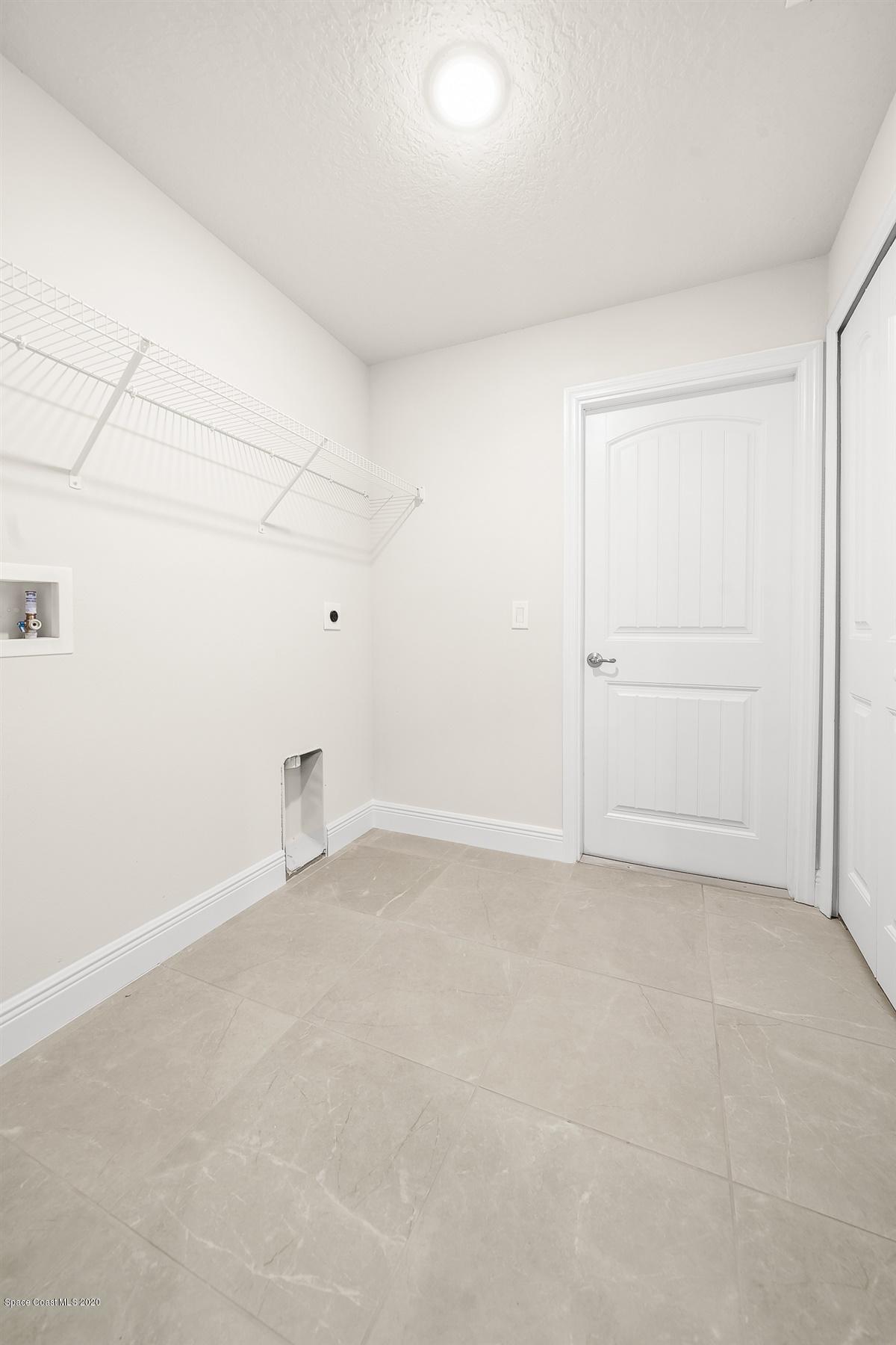 514 Avondale Road Northeast Palm Bay, FL 32907 - Photo 23 of 35 laundry room