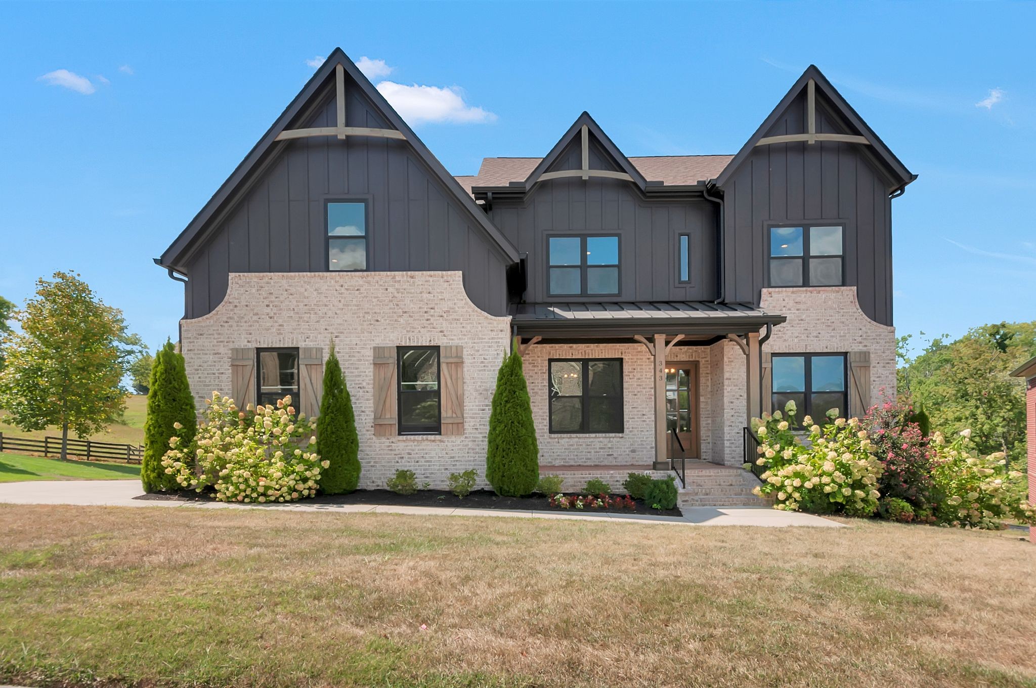 front view of house with a yard