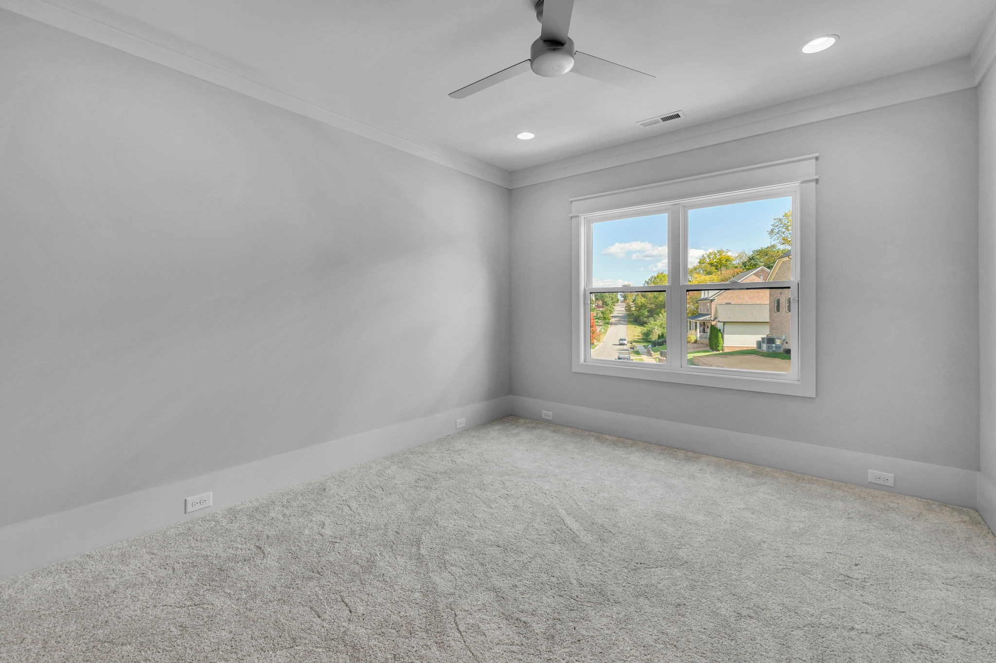 343 Circuit Road Franklin, TN 37064 - Photo 48 of 68 an empty room with windows and ceiling fan