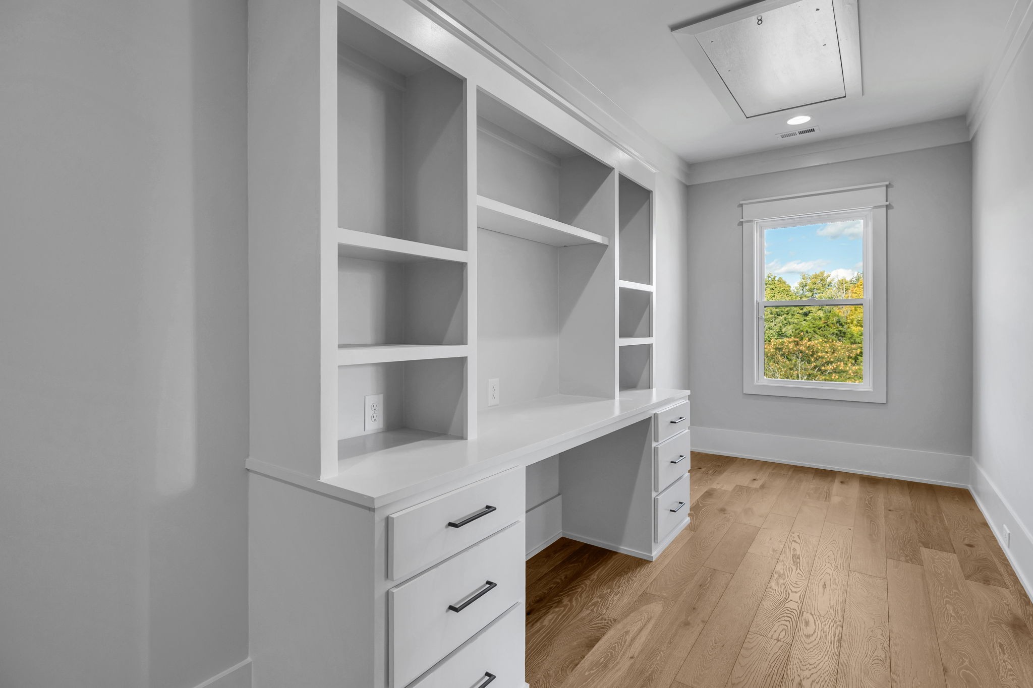 343 Circuit Road Franklin, TN 37064 - Photo 51 of 68 a hallway with cabinet and a window