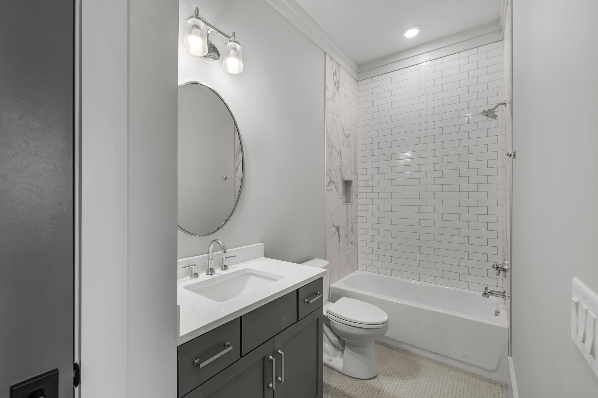 343 Circuit Road Franklin, TN 37064 - Photo 64 of 68 a bathroom with a bathtub shower sink mirror and toilet