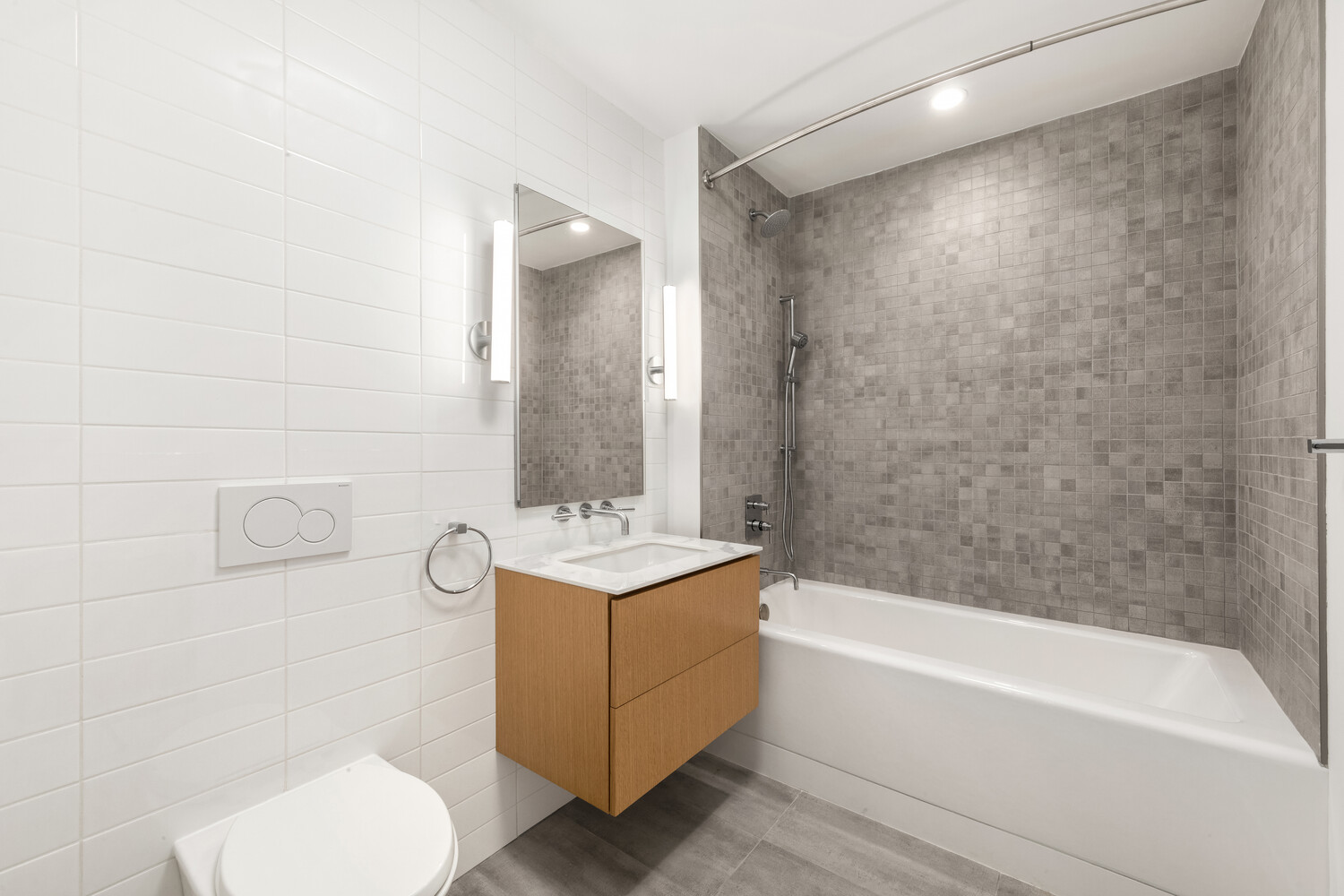 554 Broome Street, Unit 4 Manhattan, NY 10013 - Photo 9 of 13 a bathroom with a sink toilet and bathtub