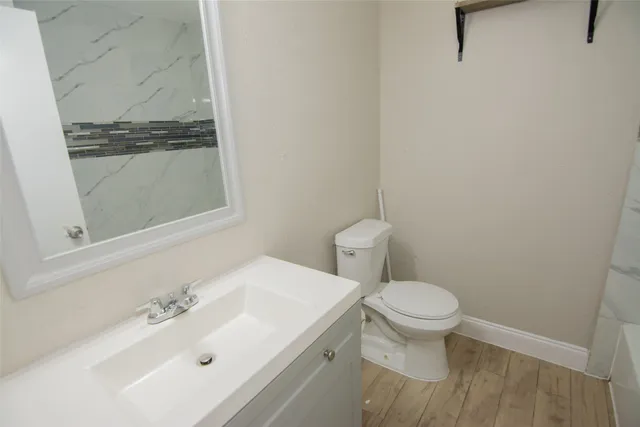 a bathroom with a sink and a toilet