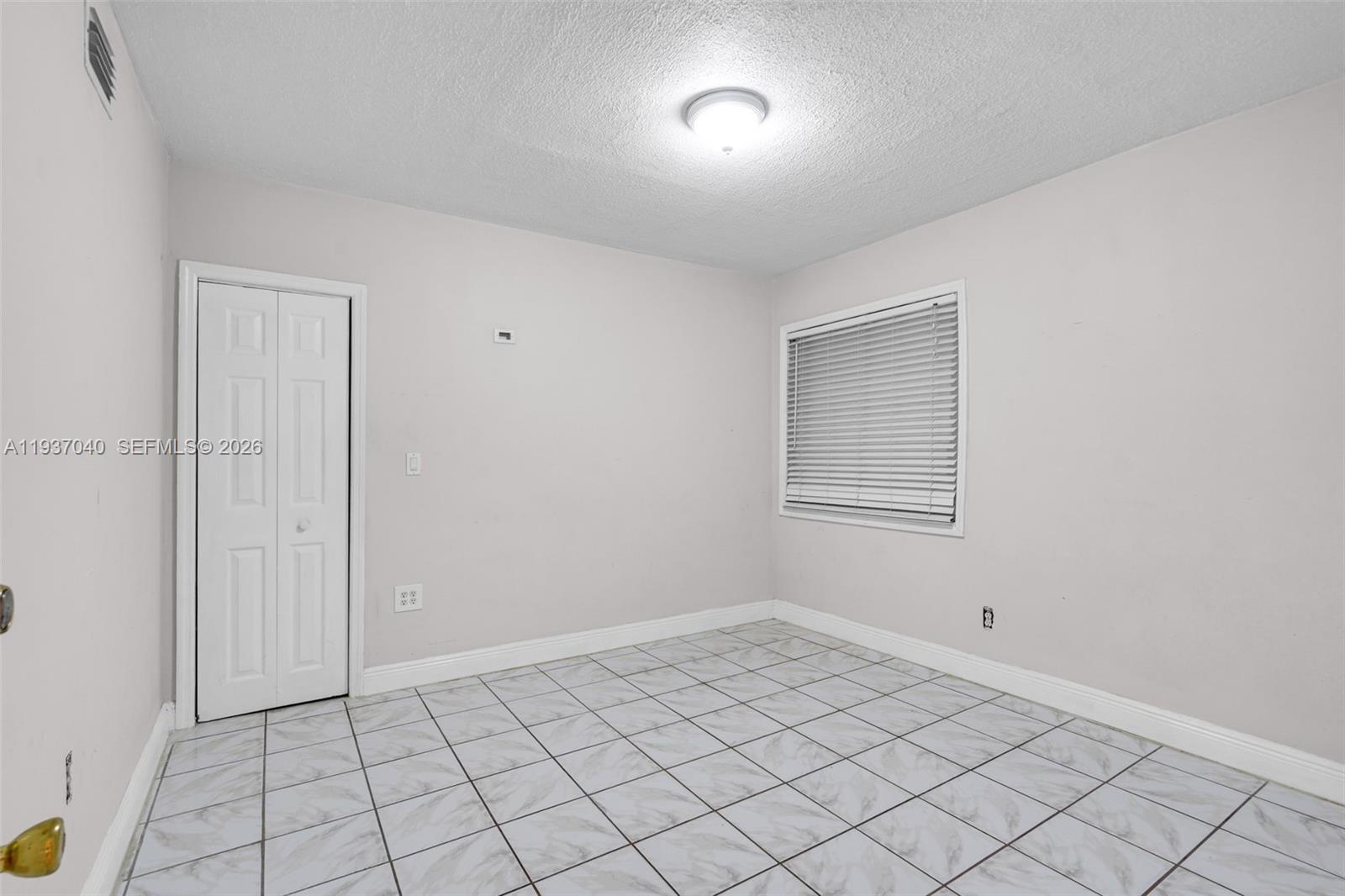 2007 Southwest 60th Avenue Miami, FL 33155 - Photo 14 of 26 a view of an empty room