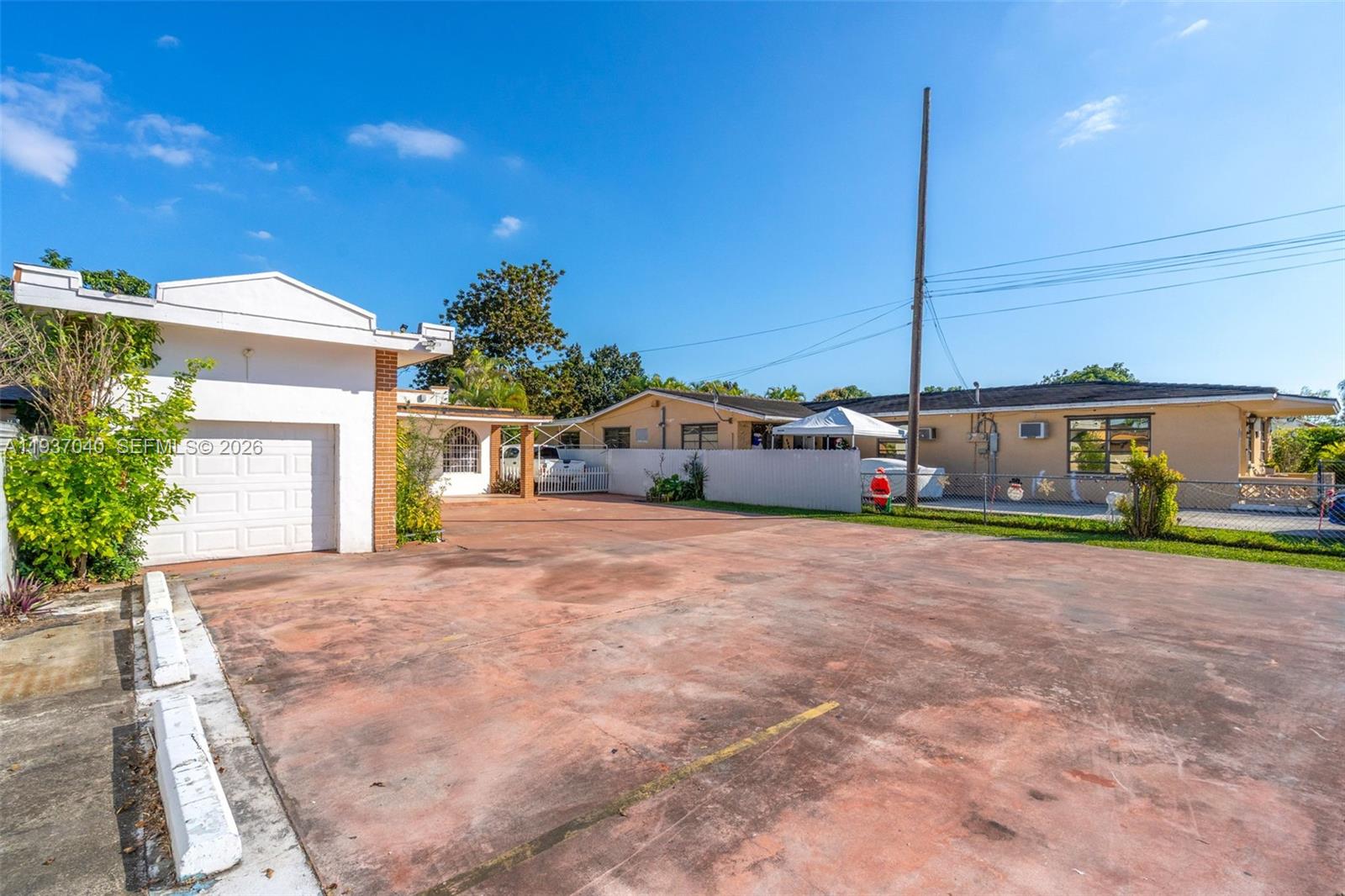2007 Southwest 60th Avenue Miami, FL 33155 - Photo 2 of 26 a house with a yard