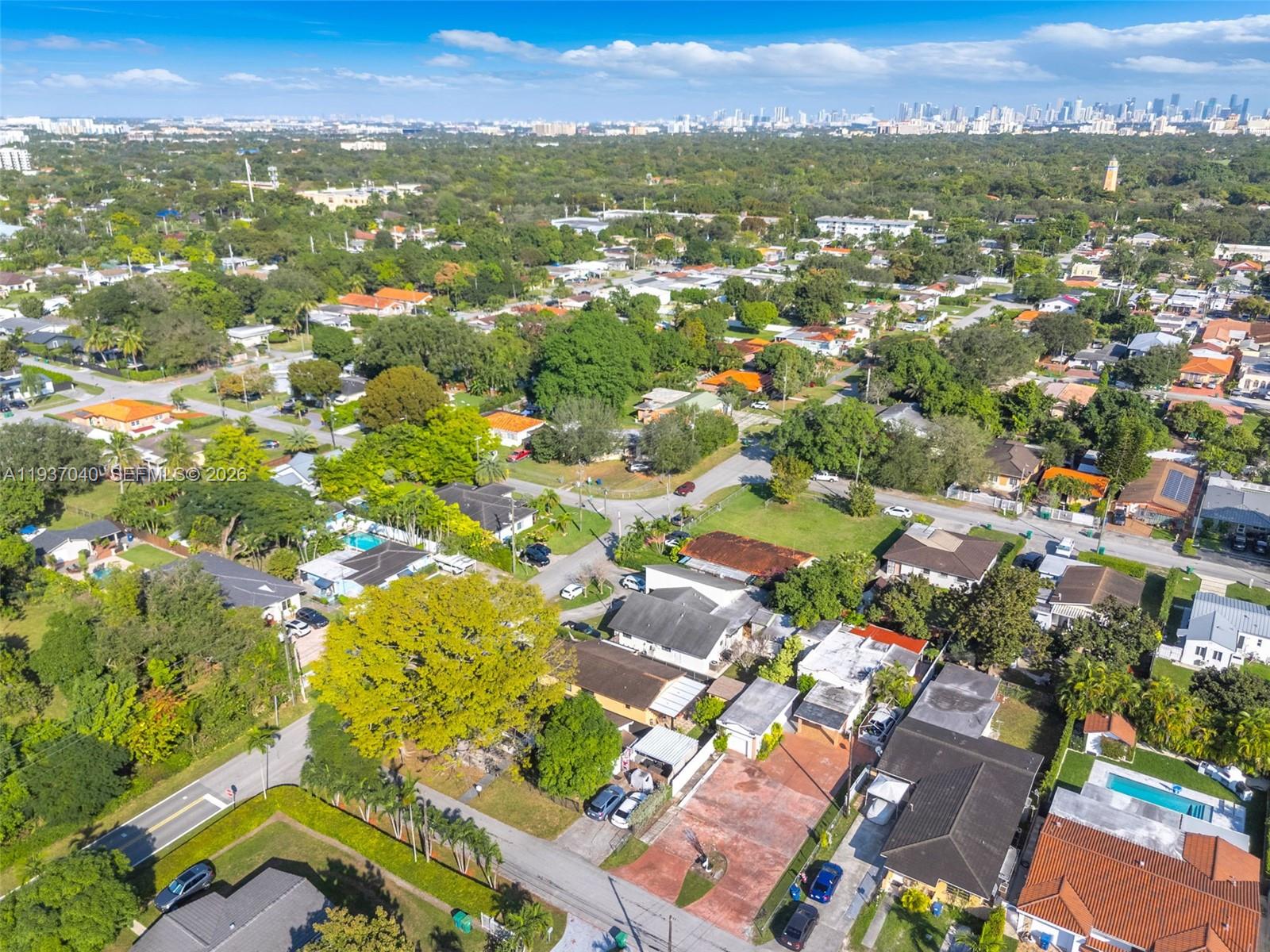 2007 Southwest 60th Avenue Miami, FL 33155 - Photo 22 of 26 an aerial view of residential houses with outdoor space and parking