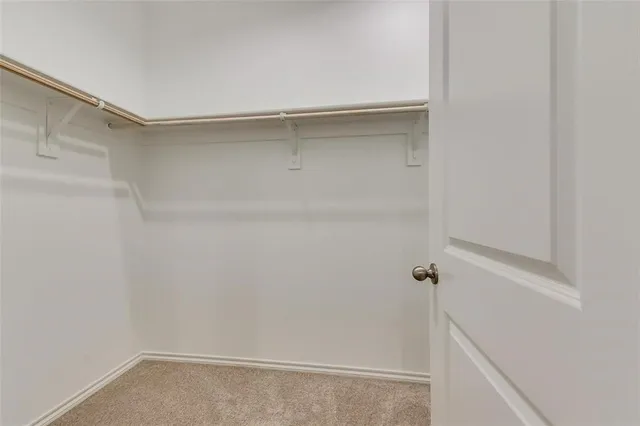 a bathroom with a sink a shower and a mirror