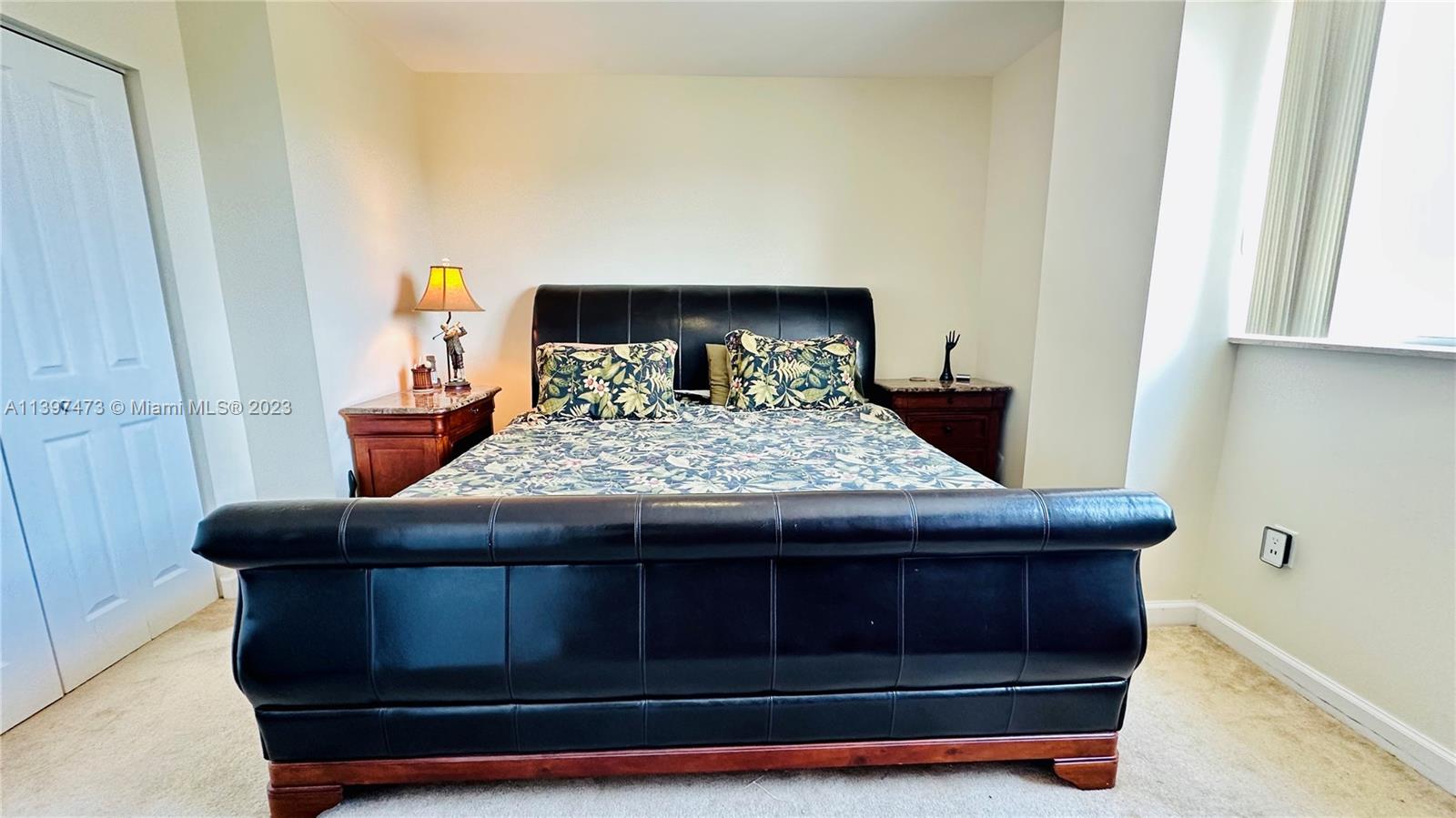 2280 Southwest 32nd Avenue, Unit 315 Miami, FL 33145 - Photo 13 of 21 a room with a bed and a window