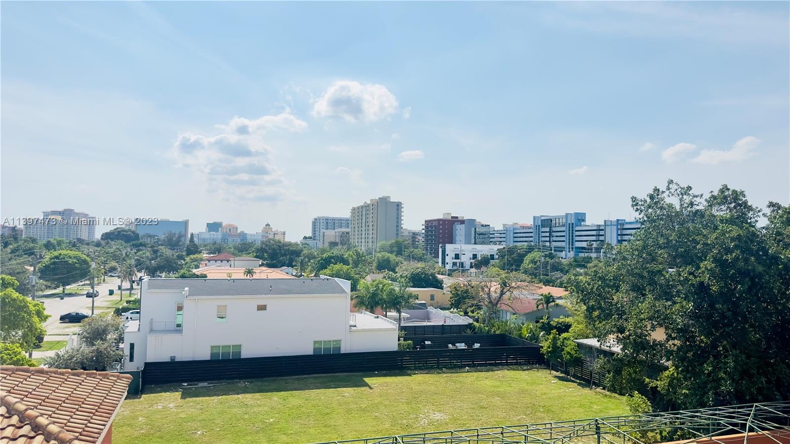 2280 Southwest 32nd Avenue, Unit 315 Miami, FL 33145 - Photo 21 of 21 a view of a swimming pool and outdoor space