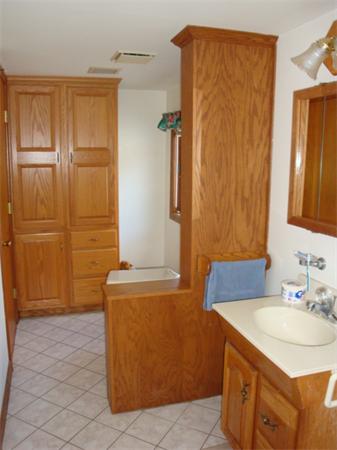 32 Middle Road Amesbury, MA 01913 - Photo 18 of 24 a bathroom with a granite countertop sink and a mirror