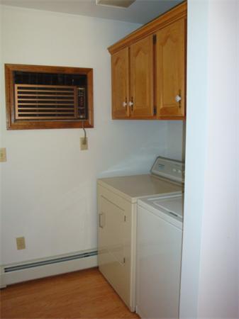 32 Middle Road Amesbury, MA 01913 - Photo 23 of 24 a utility room with dryer and washer