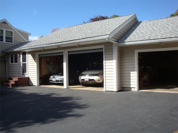 32 Middle Road Amesbury, MA 01913 - Photo 3 of 24 a view of a car garage of the house