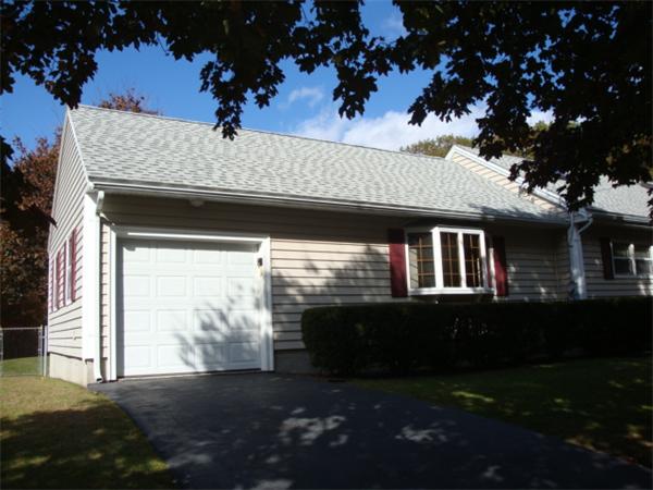32 Middle Road Amesbury, MA 01913 - Photo 4 of 24 a front view of a house with a yard