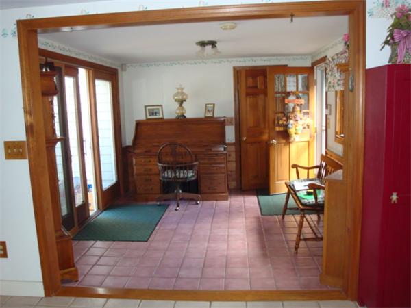 32 Middle Road Amesbury, MA 01913 - Photo 7 of 24 a living room with furniture and a fireplace