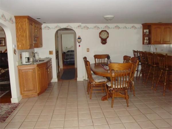 32 Middle Road Amesbury, MA 01913 - Photo 8 of 24 a view of a dining room with furniture and chandelier