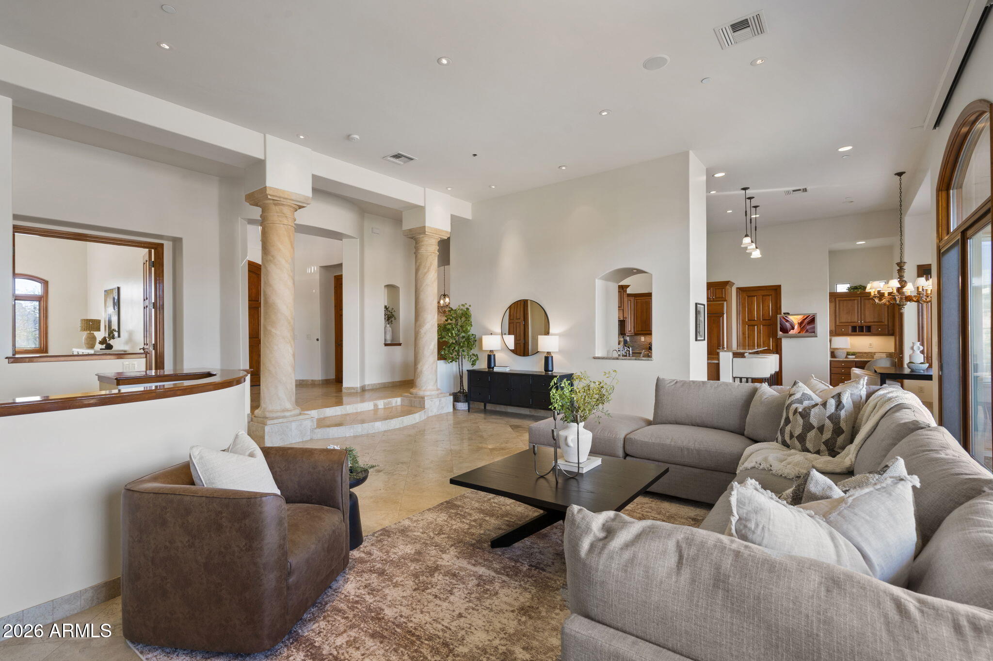 9624 Copper Ridge Trail Fountain Hills, AZ 85268 - Photo 9 of 57 a living room with furniture and a large mirror