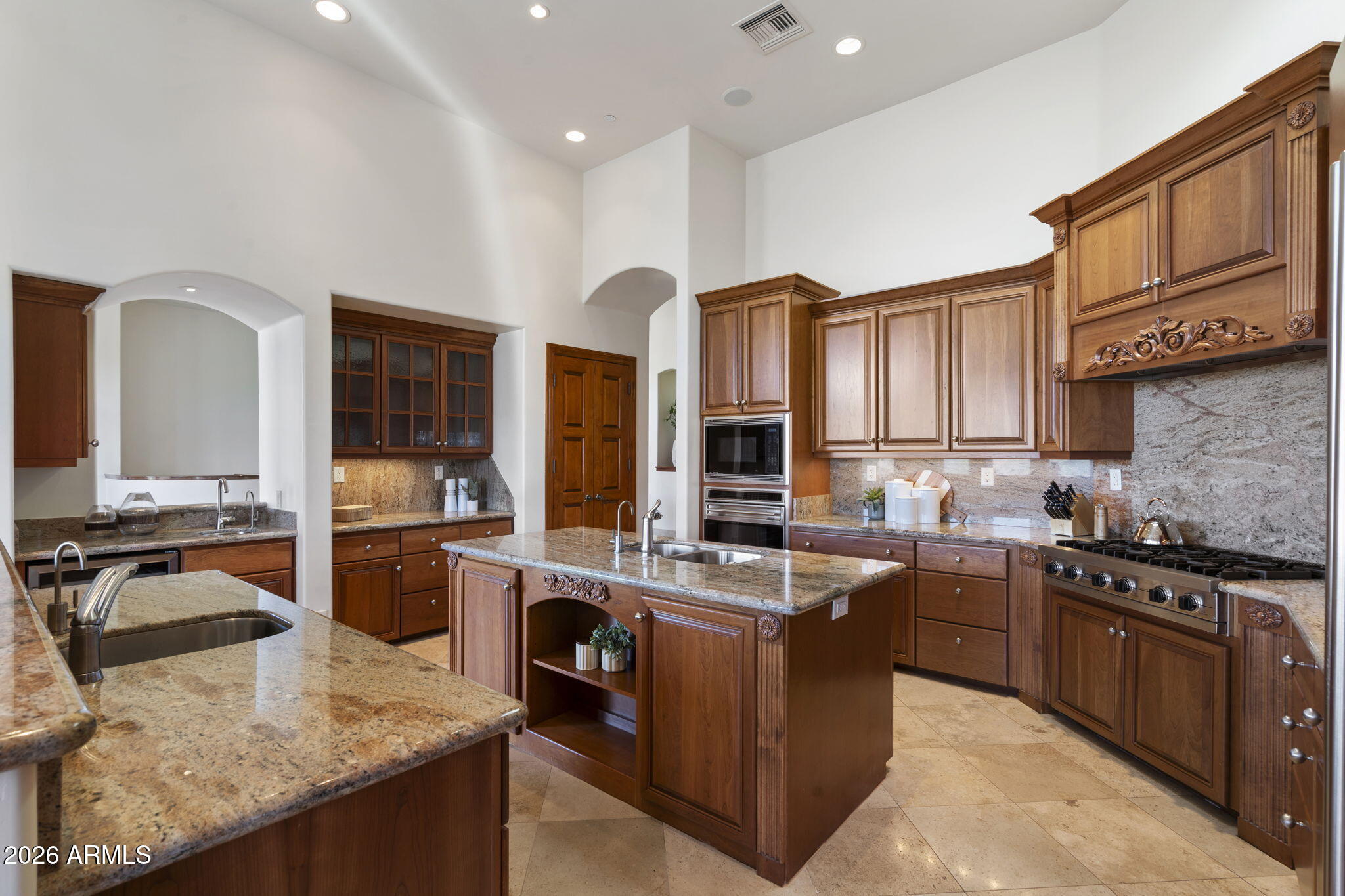 9624 Copper Ridge Trail Fountain Hills, AZ 85268 - Photo 12 of 57 a kitchen with stainless steel appliances granite countertop a sink stove and refrigerator