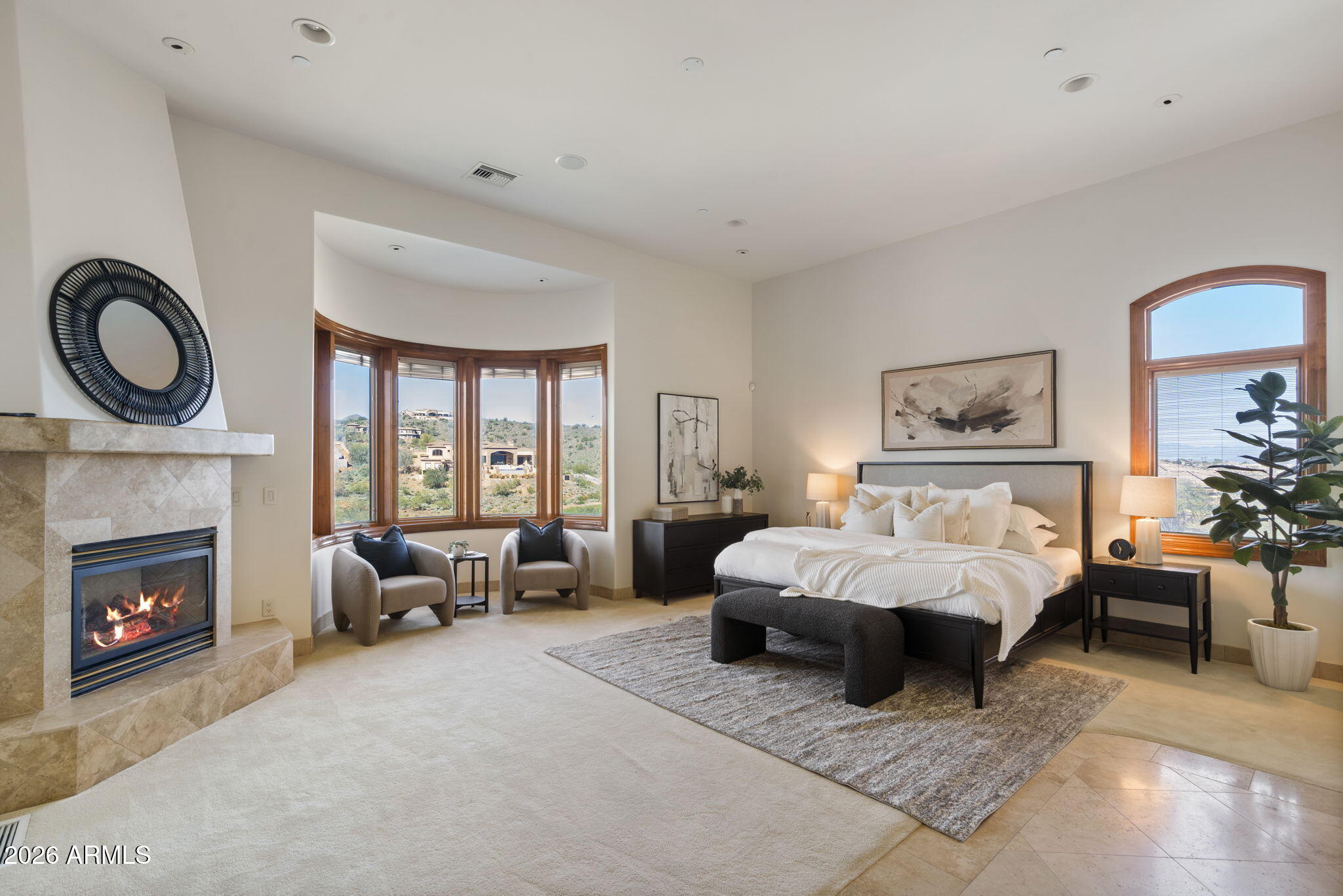 9624 Copper Ridge Trail Fountain Hills, AZ 85268 - Photo 18 of 57 a spacious bedroom with a bed a couch and a fireplace