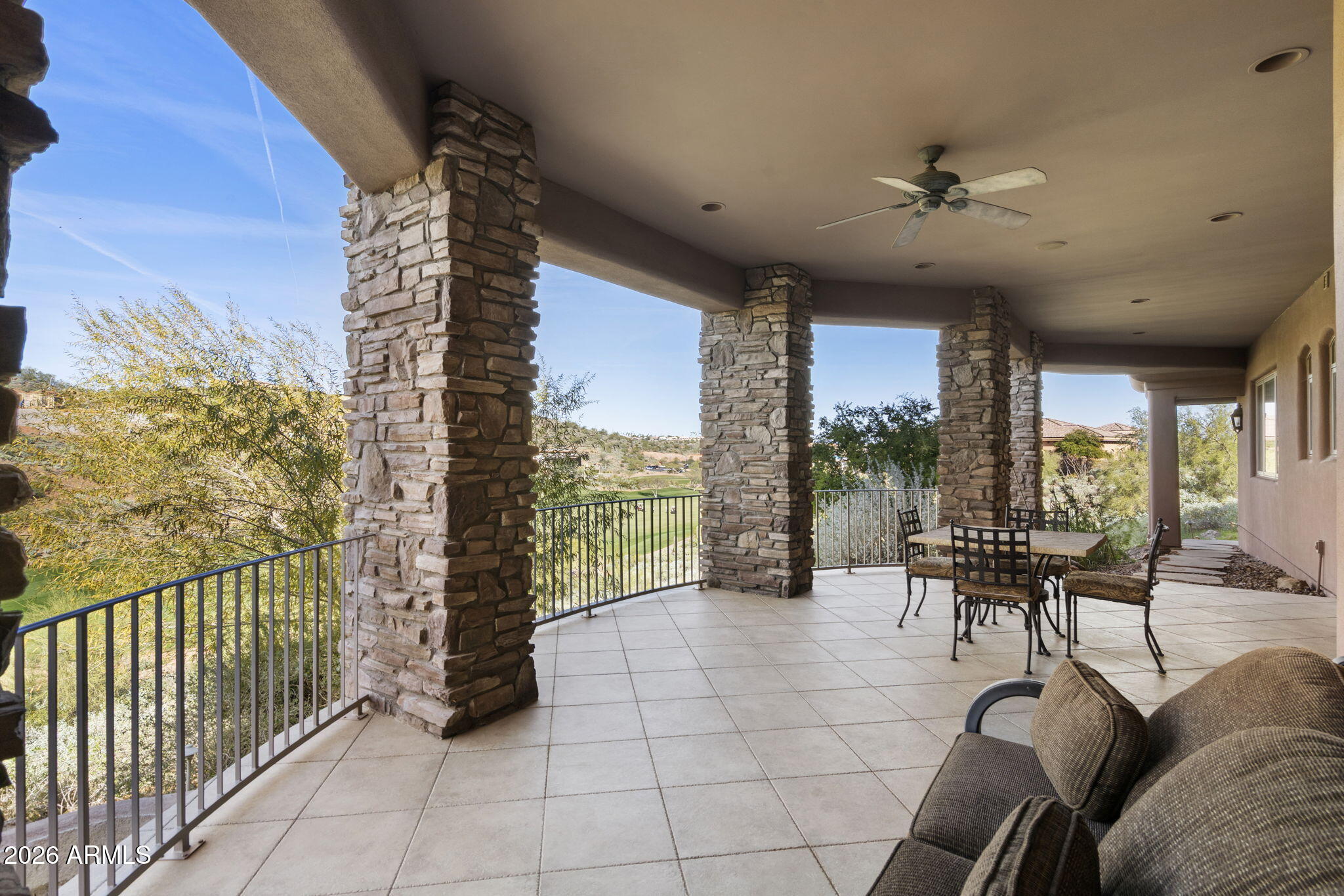 9624 Copper Ridge Trail Fountain Hills, AZ 85268 - Photo 25 of 57 a living room with furniture and a floor to ceiling window