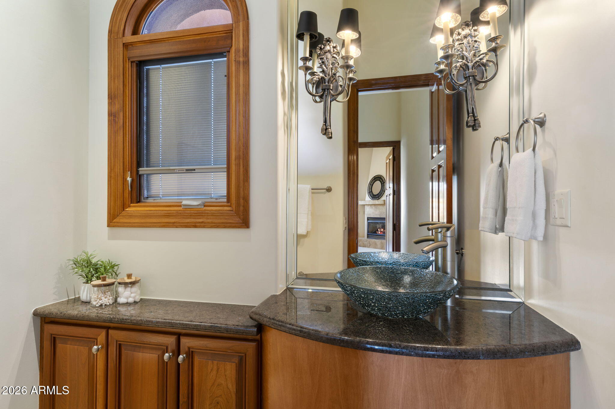 9624 Copper Ridge Trail Fountain Hills, AZ 85268 - Photo 34 of 57 a bathroom with a granite countertop sink a mirror and a shower