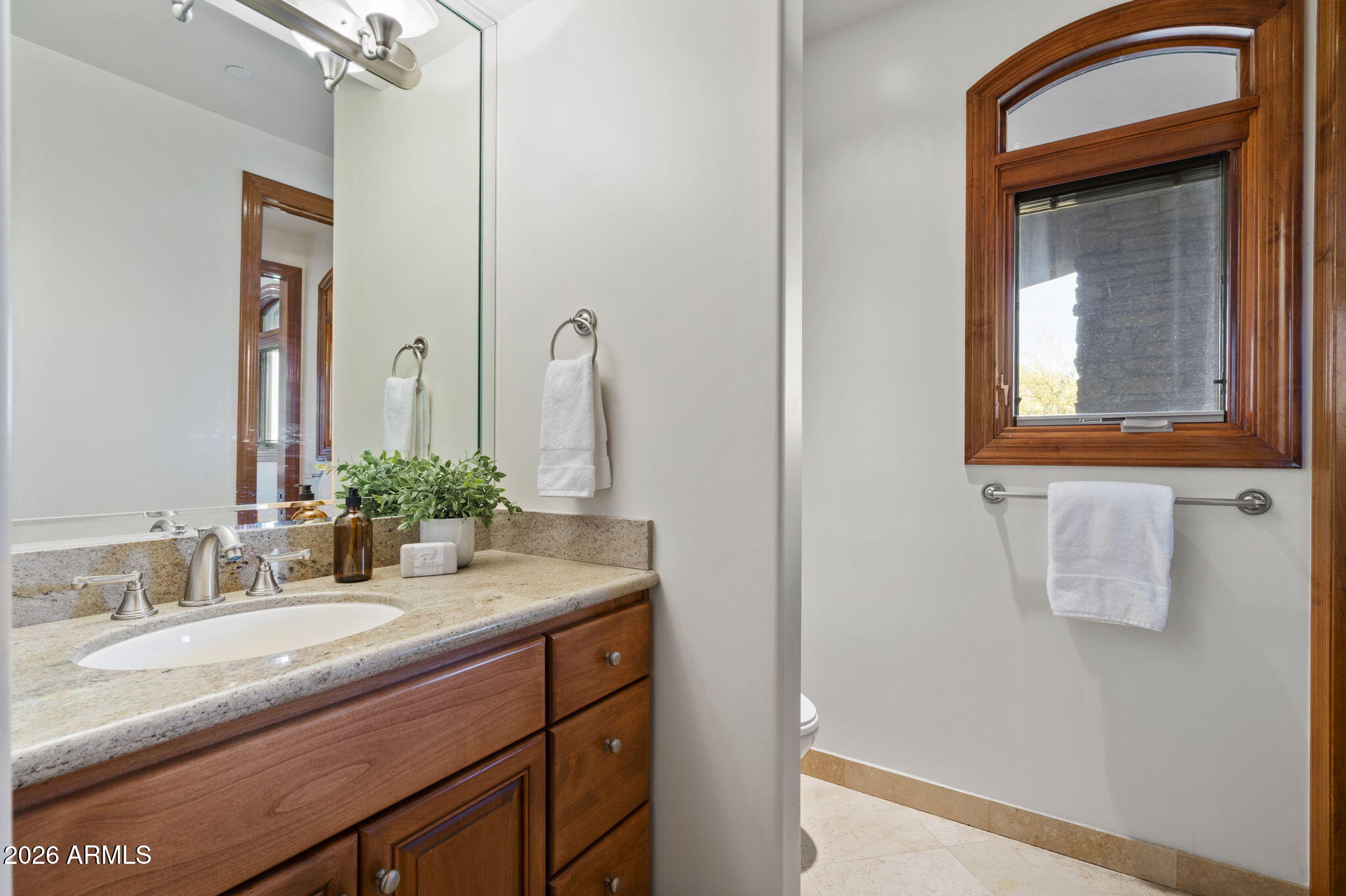 9624 Copper Ridge Trail Fountain Hills, AZ 85268 - Photo 39 of 57 a bathroom with a sink and a mirror