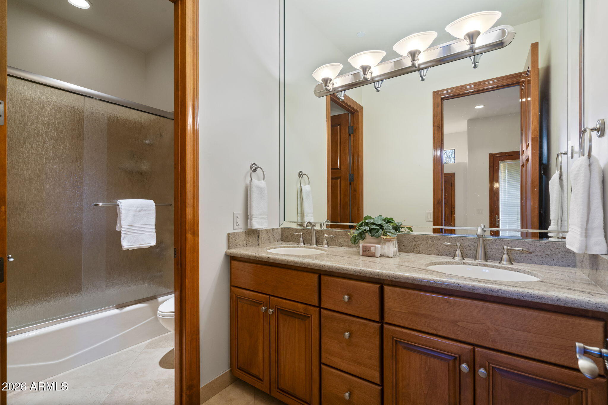9624 Copper Ridge Trail Fountain Hills, AZ 85268 - Photo 40 of 57 a bathroom with a double vanity sink mirror and shower