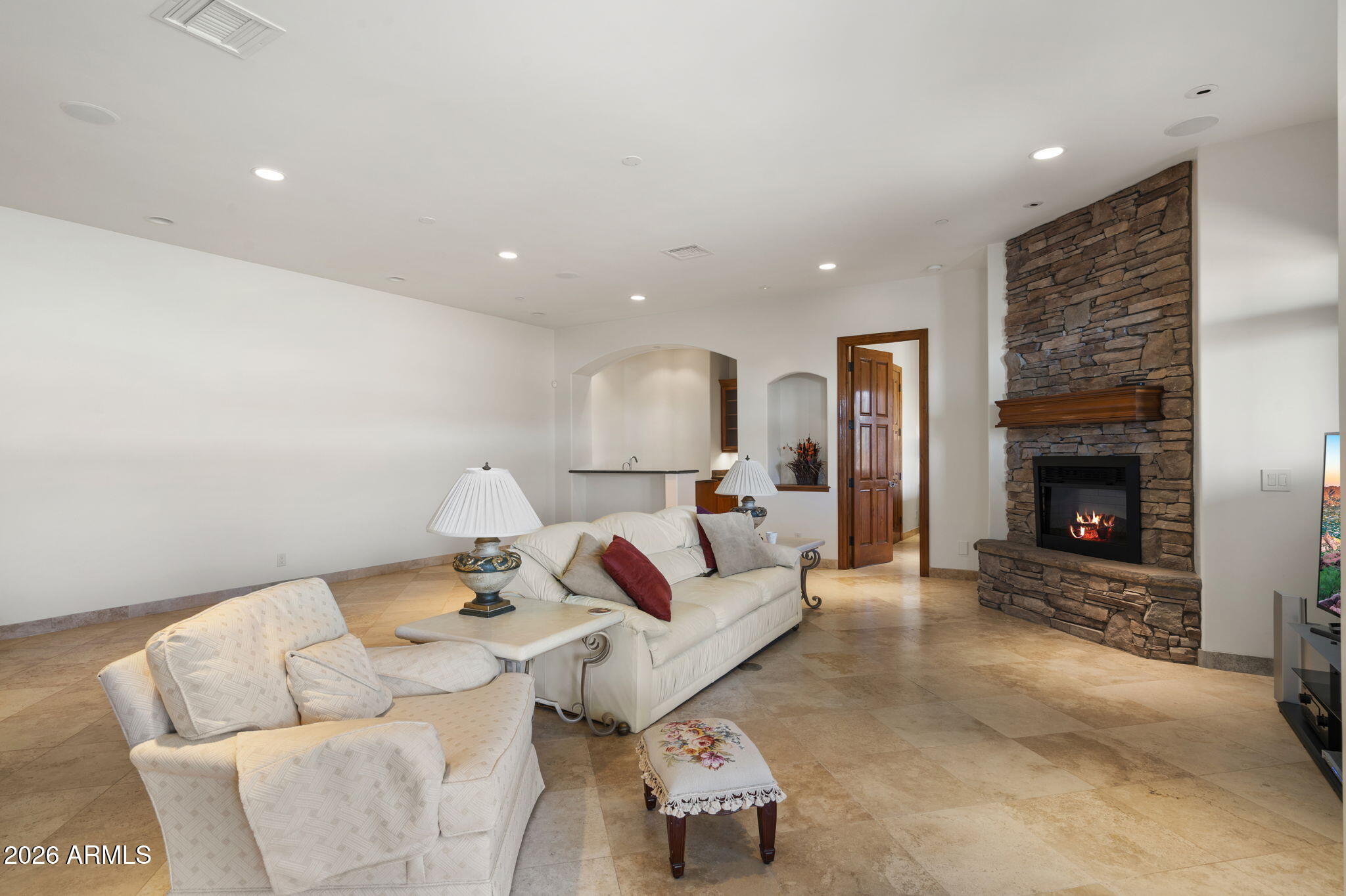 9624 Copper Ridge Trail Fountain Hills, AZ 85268 - Photo 44 of 57 a living room with furniture and a fireplace