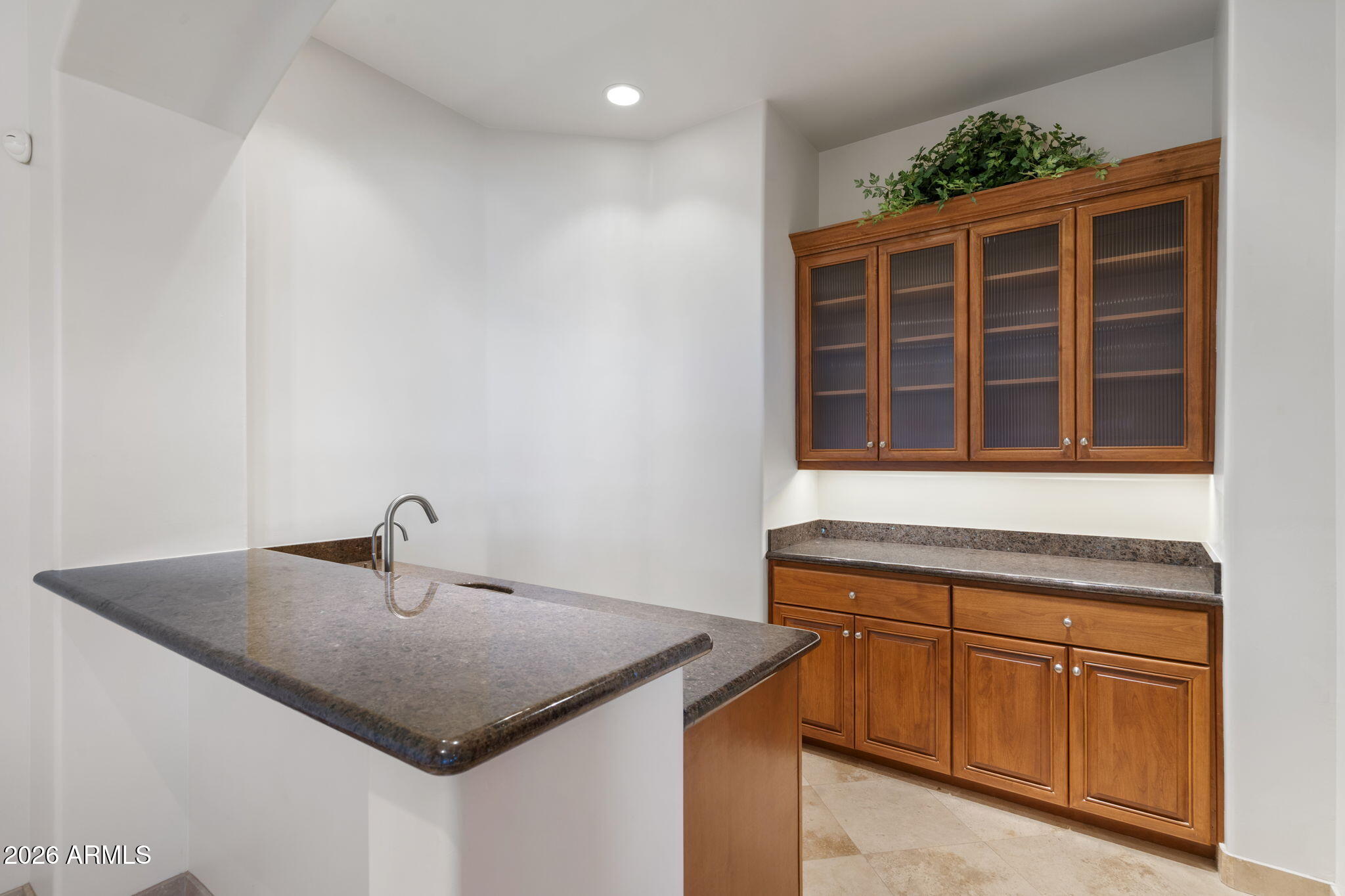 9624 Copper Ridge Trail Fountain Hills, AZ 85268 - Photo 46 of 57 a kitchen with a sink and cabinets