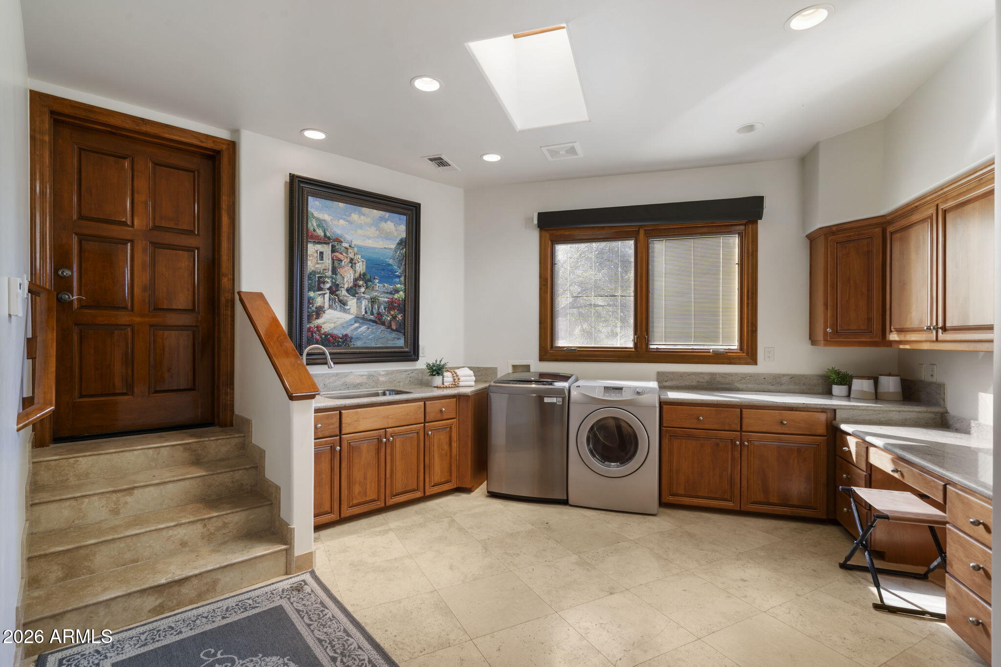 9624 Copper Ridge Trail Fountain Hills, AZ 85268 - Photo 47 of 57 a view of a kitchen with a sink and dishwasher a stove top oven with wooden floor