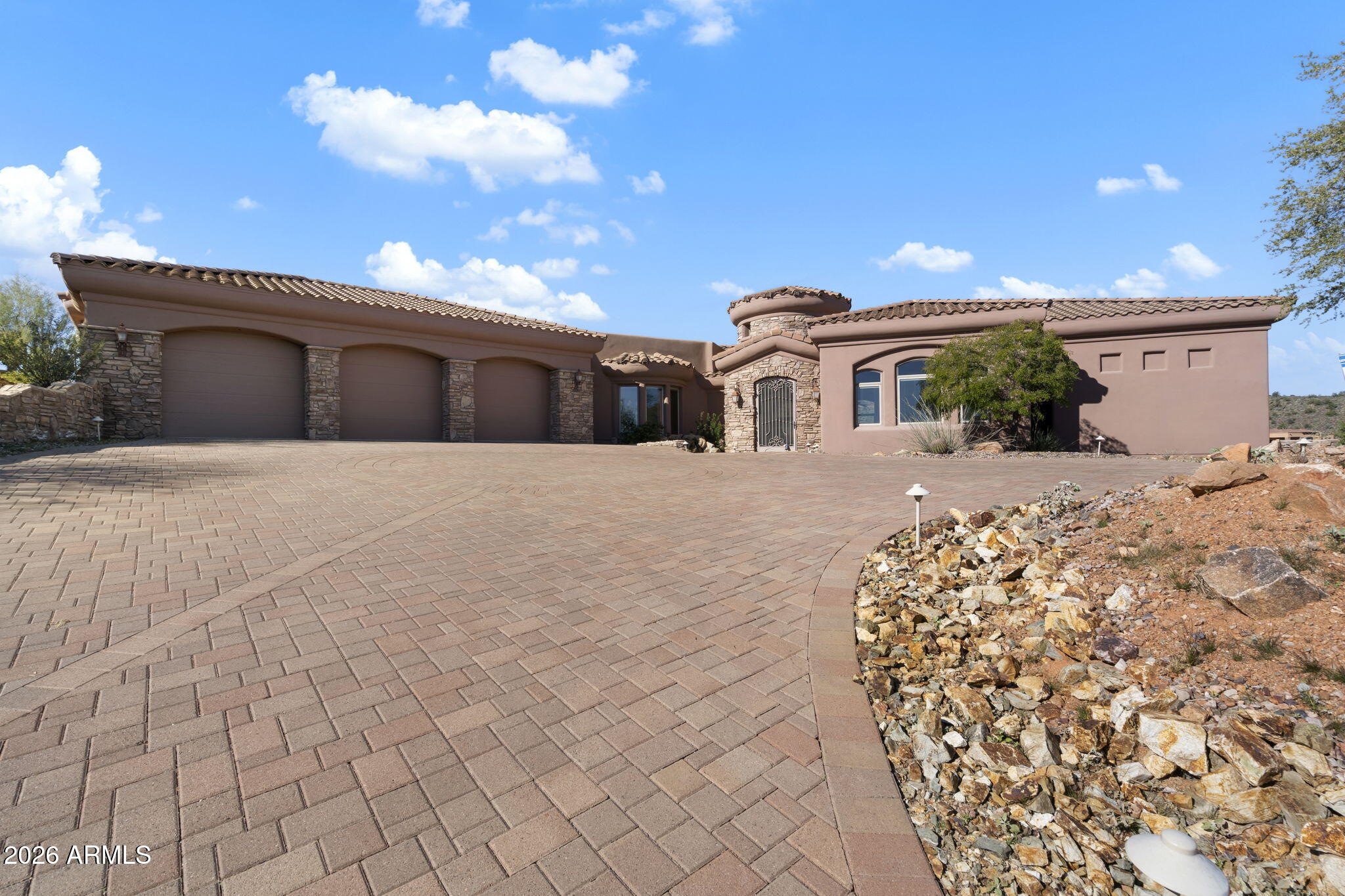 9624 Copper Ridge Trail Fountain Hills, AZ 85268 - Photo 49 of 57 a front view of a house with a yard and garage