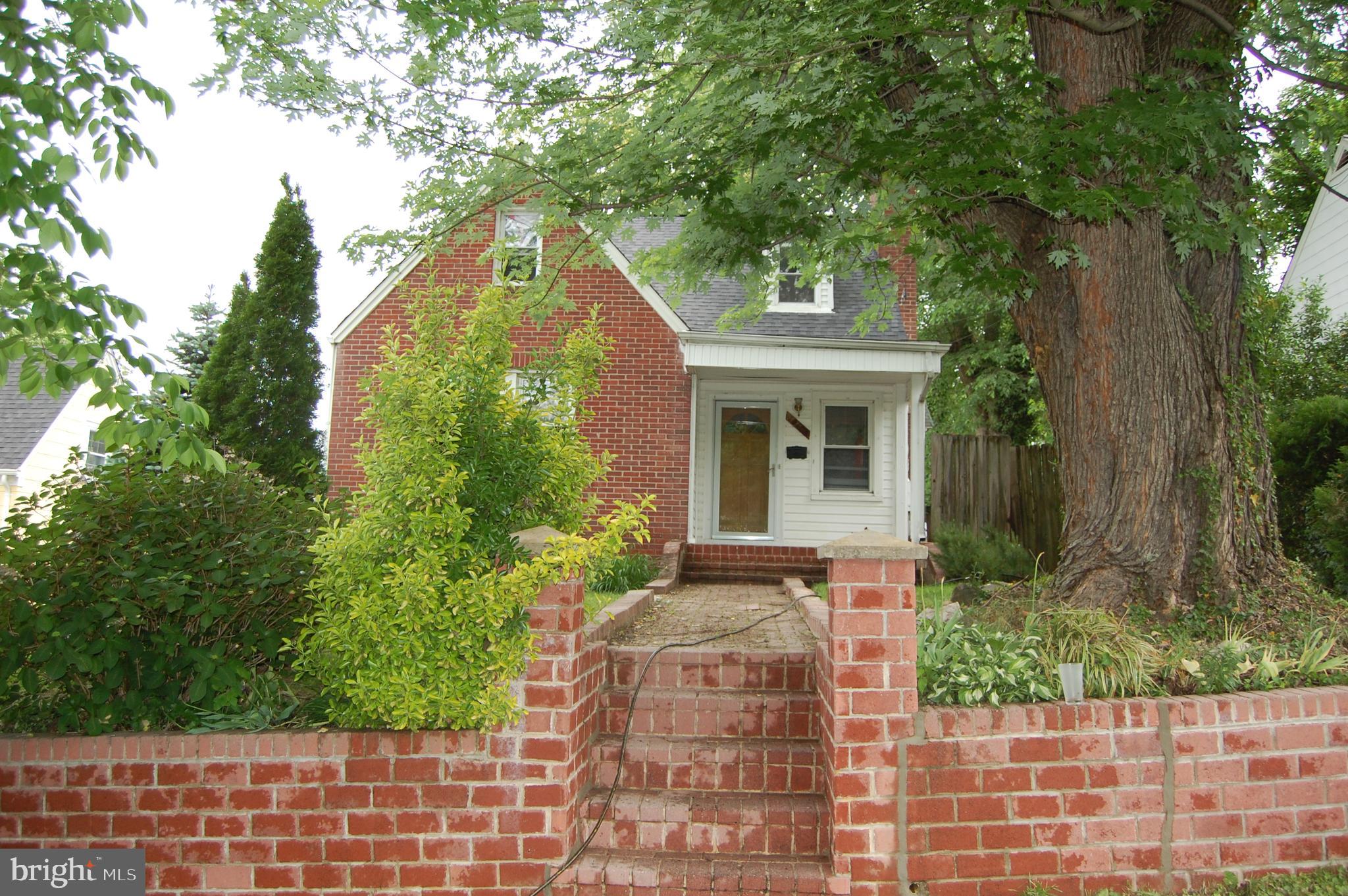 10409 Amherst Avenue Silver Spring, MD 20902 - Photo 2 of 47 Front Entrance with Brick Entryway
