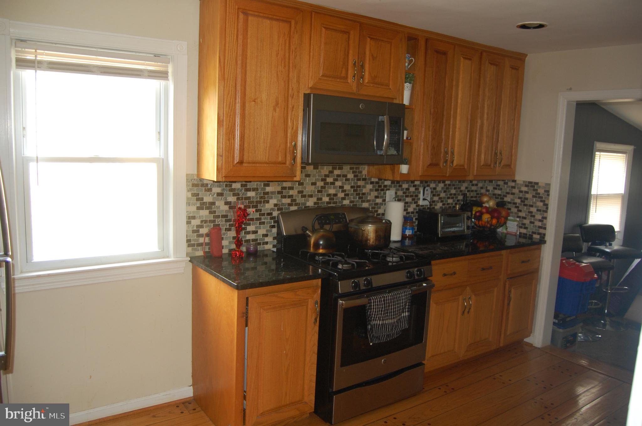 10409 Amherst Avenue Silver Spring, MD 20902 - Photo 12 of 47 Kitchen With Stainless Steel Appliances