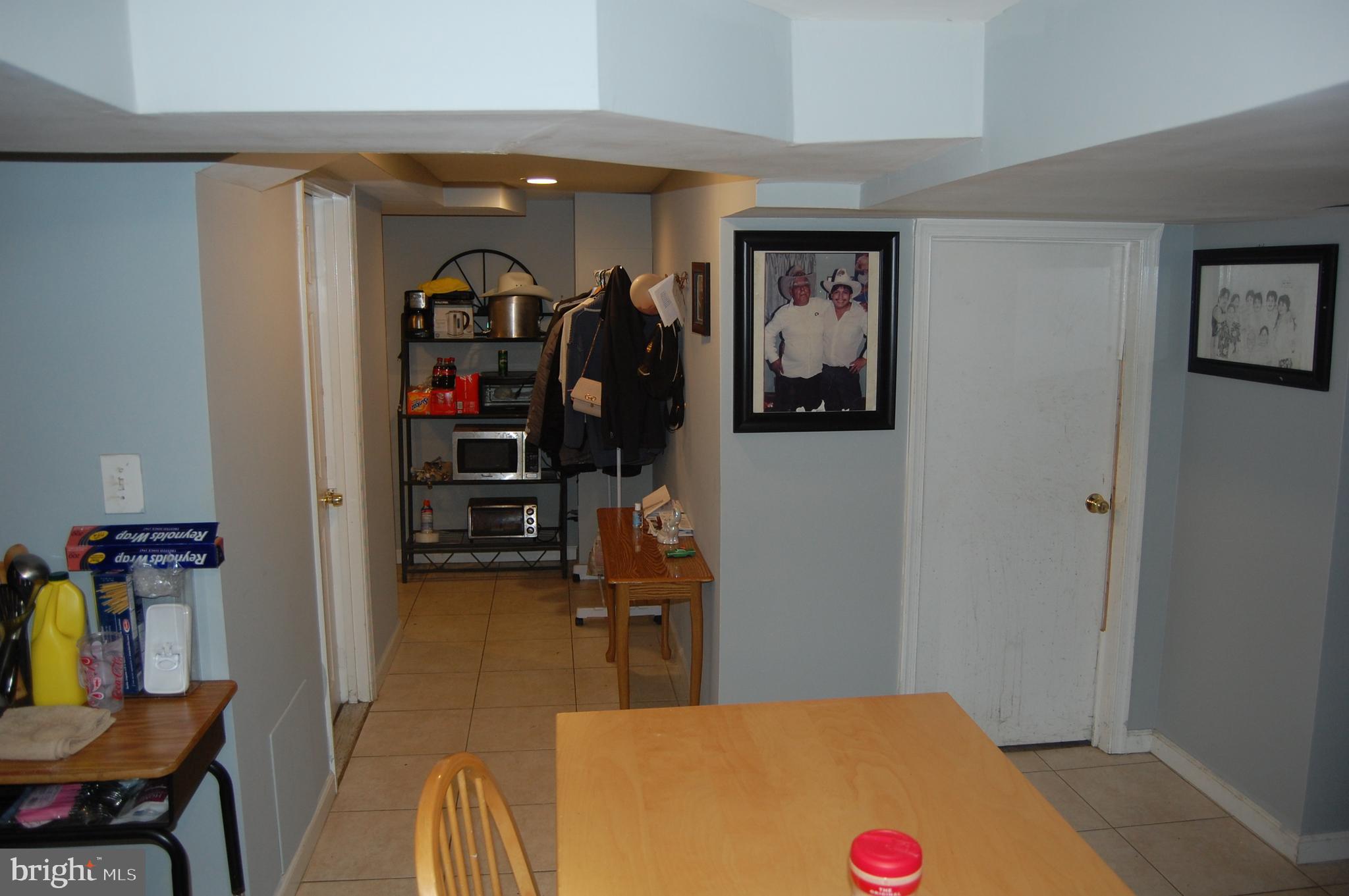 10409 Amherst Avenue Silver Spring, MD 20902 - Photo 25 of 47 Basement Hallway Leading to Eating Area