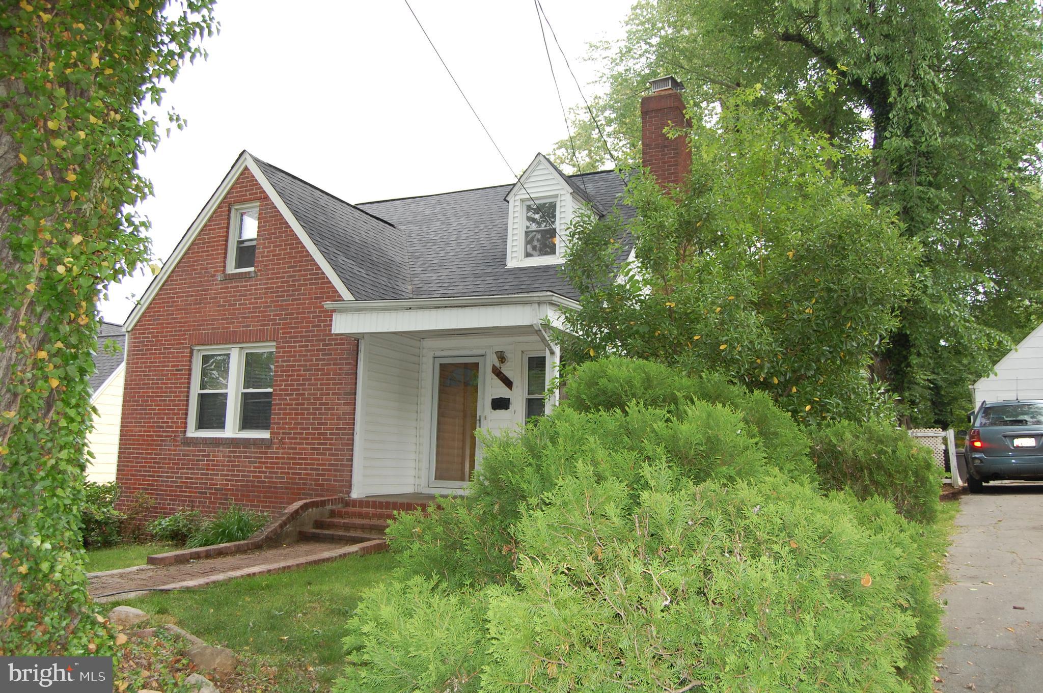 10409 Amherst Avenue Silver Spring, MD 20902 - Photo 4 of 47 Exterior Front - Side View