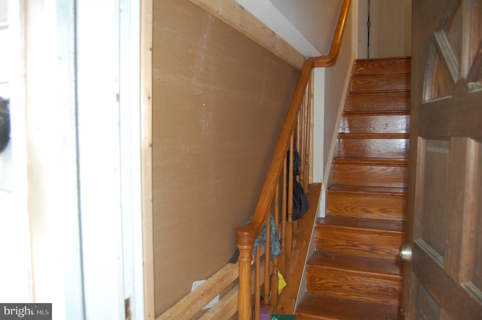 10409 Amherst Avenue Silver Spring, MD 20902 - Photo 41 of 47 Wall currently separates upstairs as separate unit